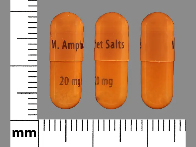 20 mg сколько. Аддерал капсула. Adderall XR 20. Оранжевые капсулы. Капсулы оранжевого цвета от туберкулеза.